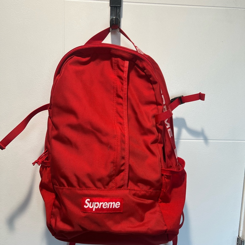 Supreme Red Backpack with Durable Fabric and Classic Design